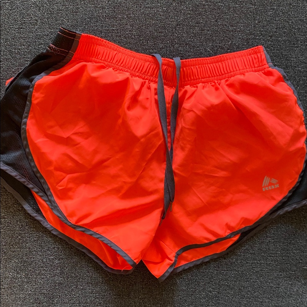 🔥 RBX orange and black running shorts
